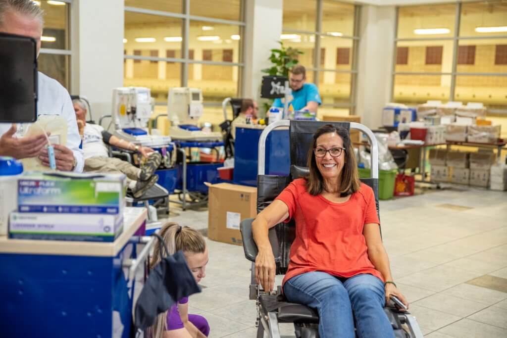 Woman giving blood.